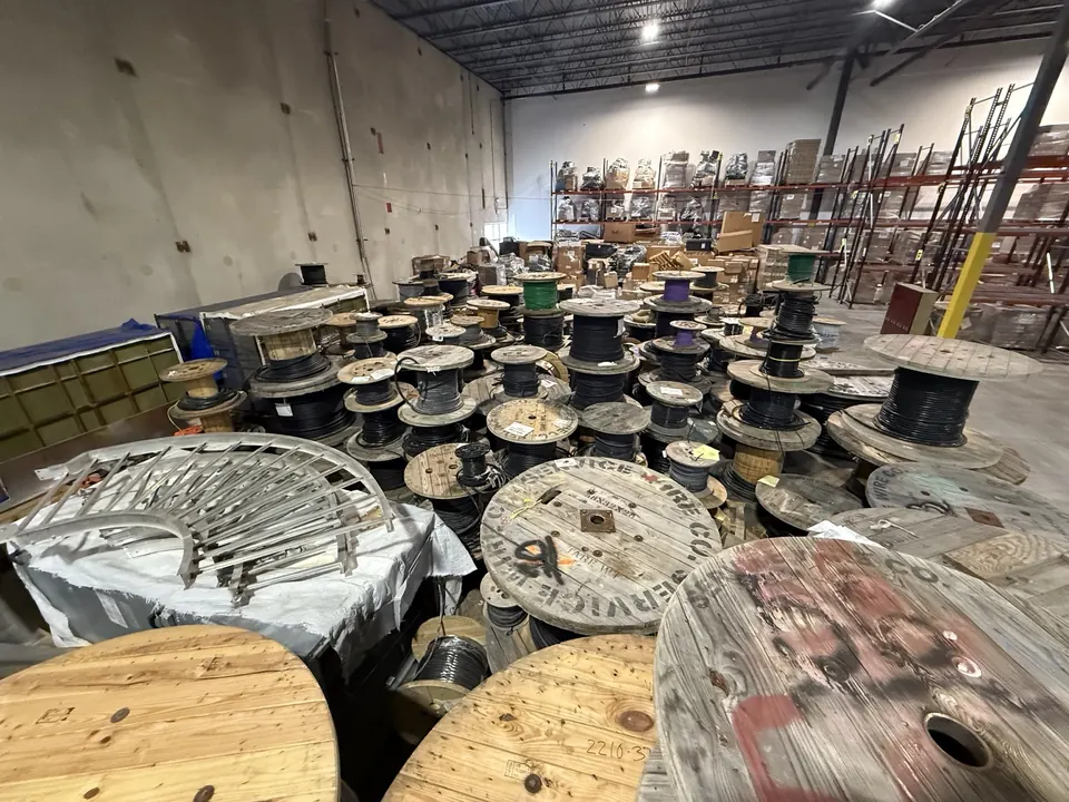 Commercial electrical wire reels and packaged inventory prepared for review