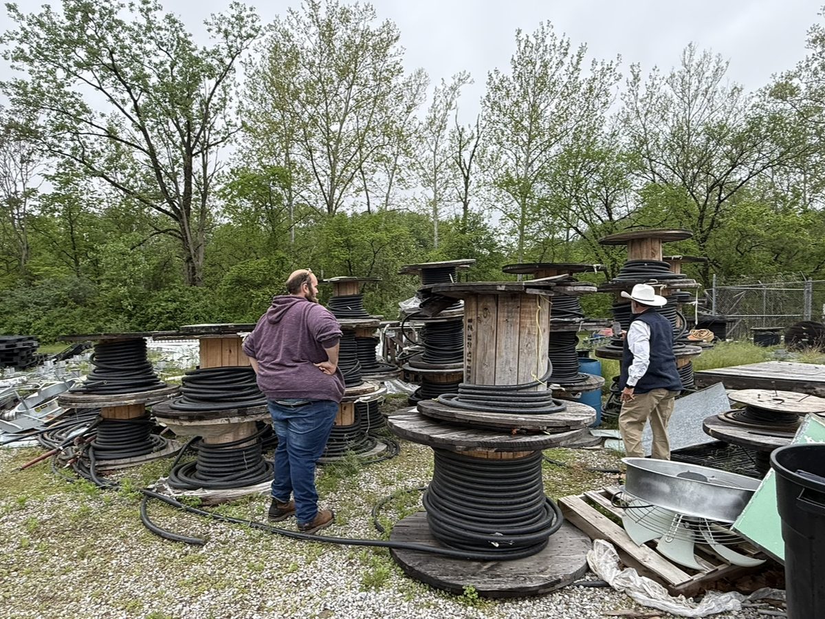Our team inspecting surplus wire reels on site before purchase